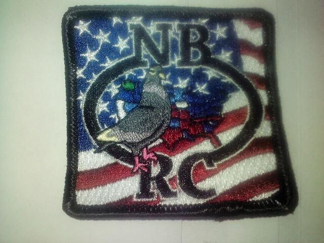 A patch with an eagle and the words " nb rc " on it.